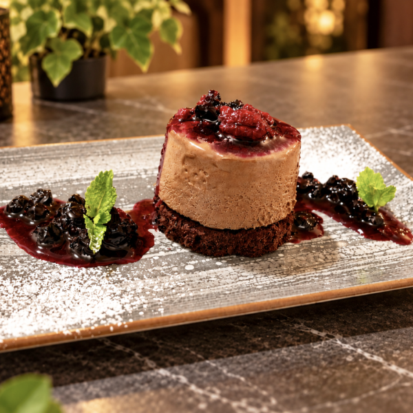 Chocolate tartlet, forest fruit compote